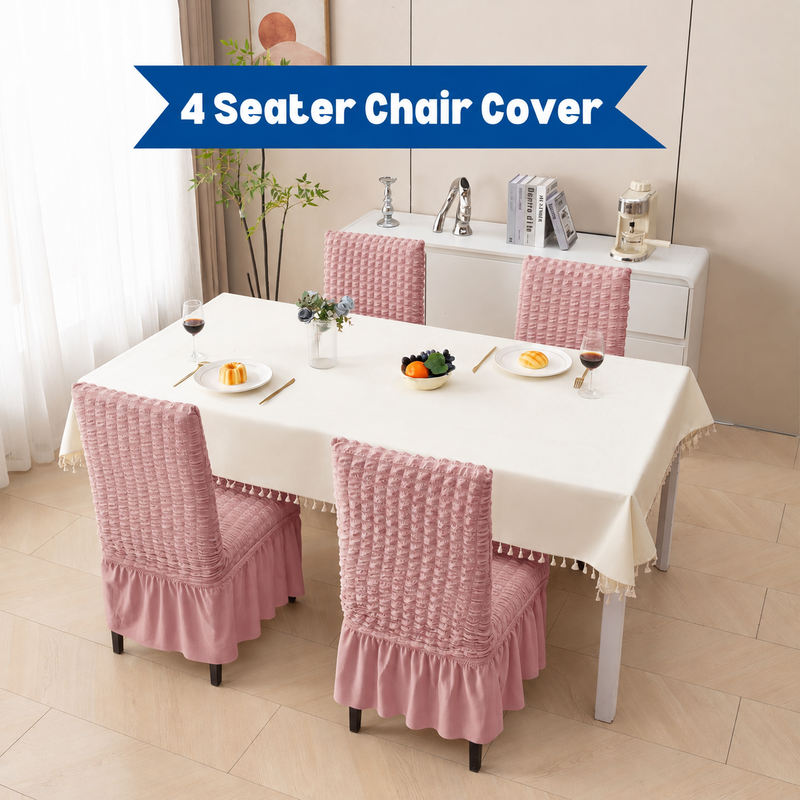 Four Pink chair covers around a dining table