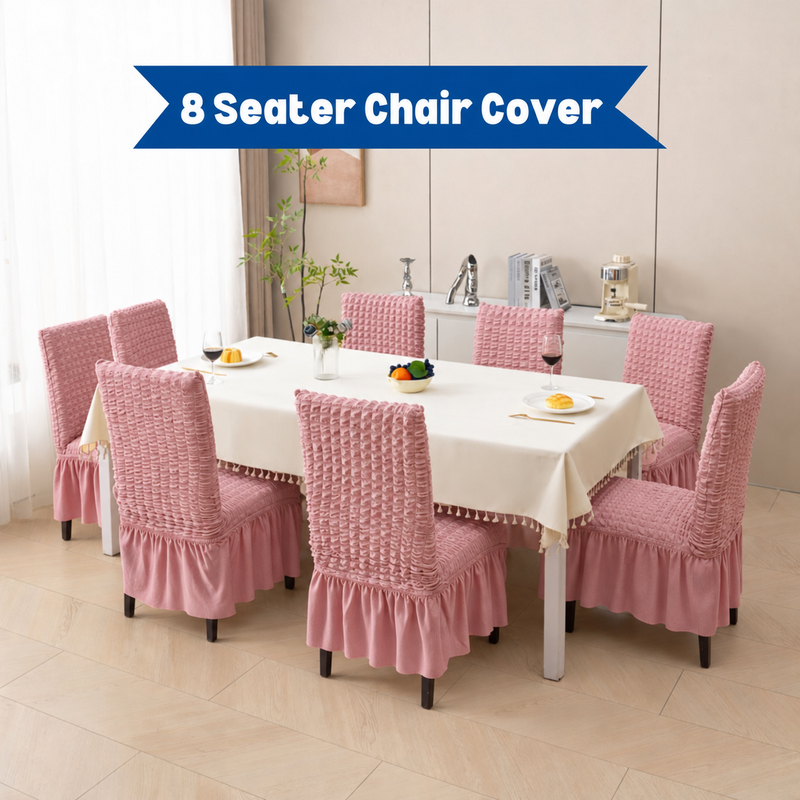 Eight Pink chair covers around a dining table