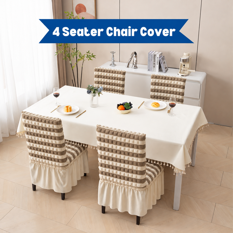 Set of 4 warm taupe and ivory striped chair covers with ivory frill around a dining table