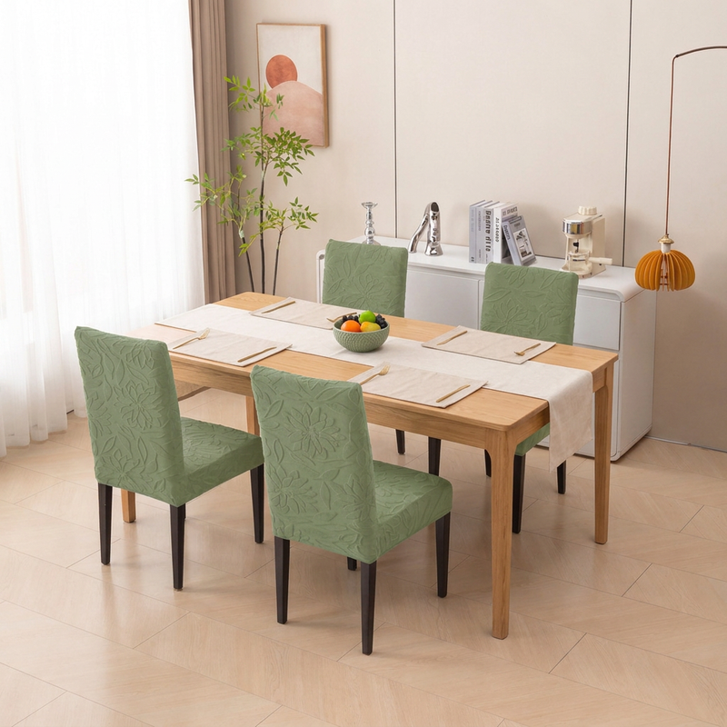 Green four chair dining arrangement