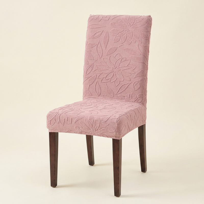 Pink chair cover studio three-quarter view